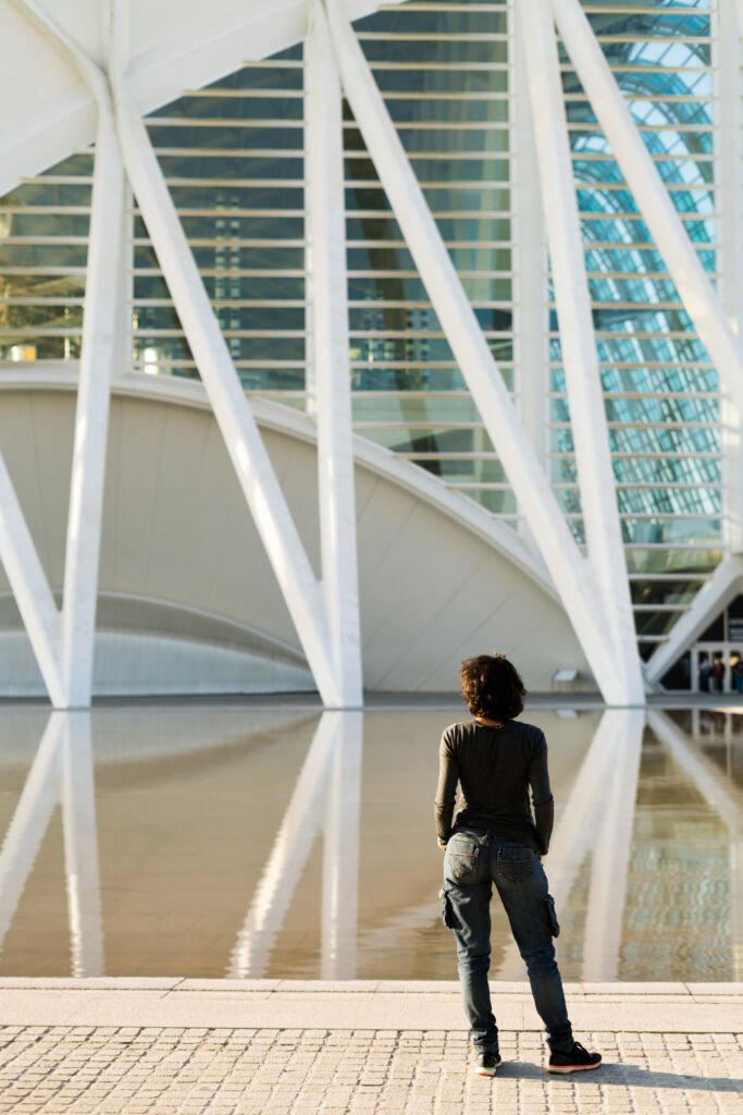 
Rearview shot of a woman looking at an abstract construction